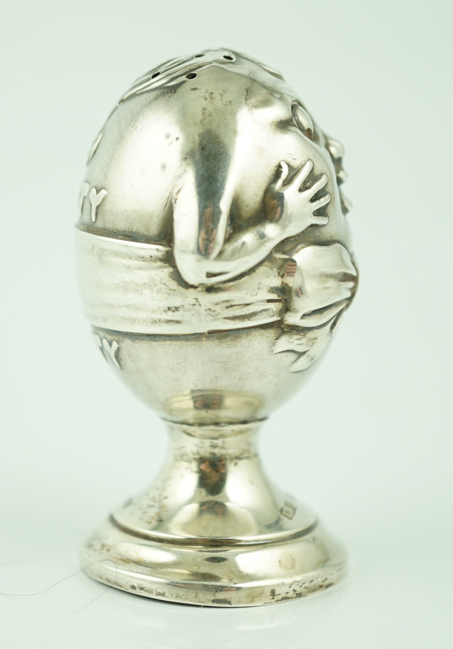 A George V novelty silver pepperette, modelled as Humpty Dumpty, by Levy & Salaman